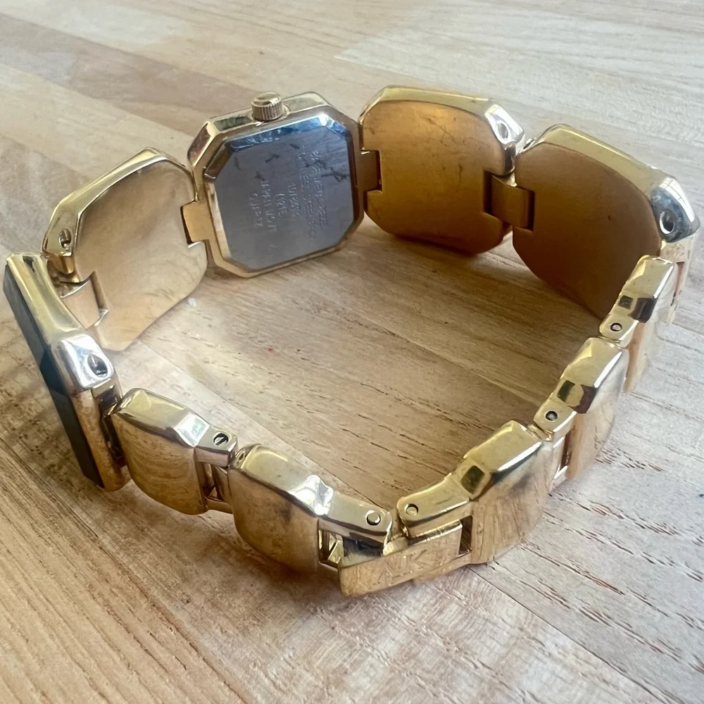 Anne Klein ladies black dial gold tone bracelet watch NEW BATTERY